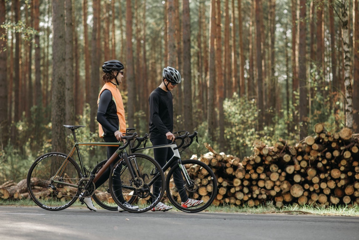 Different styles of cycling helmets displayed on a neutral background