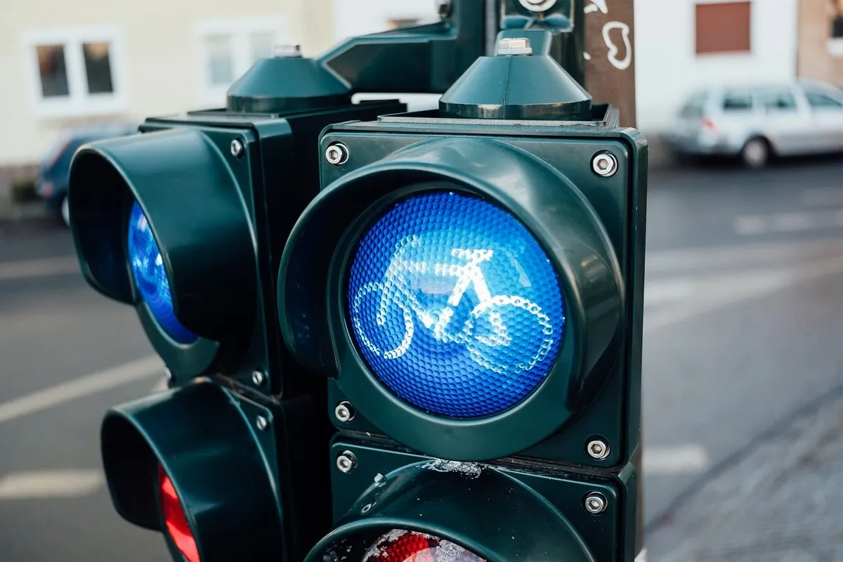 bicycle traffic light, bicycle light signal, cycle path traffic light, traffic lights, blue light, bicycle signal, cyclist traffic light, traffic control, road