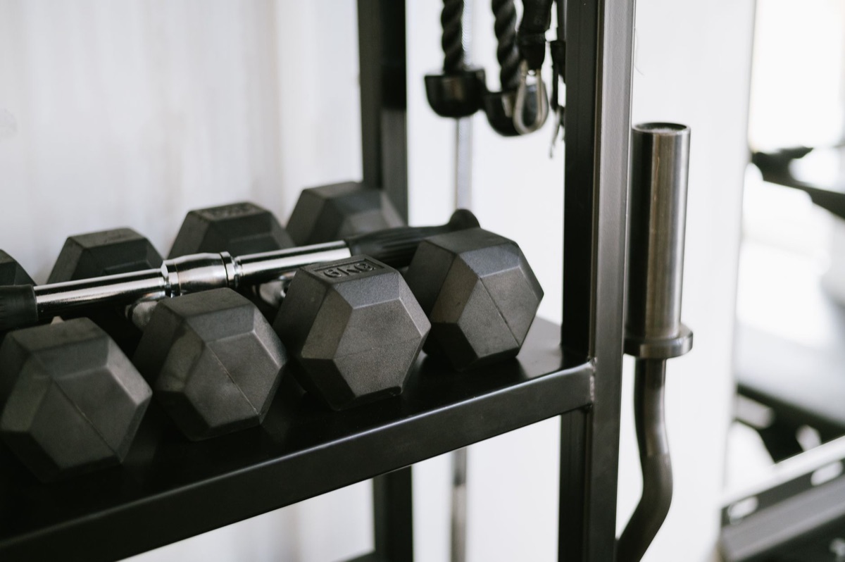 Gym equipment in home with weights and resistance bands